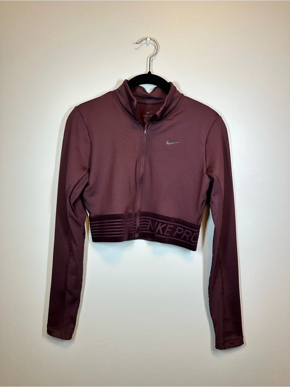 Nike Dri-FIT Cropped Zip Jacket in Burgundy